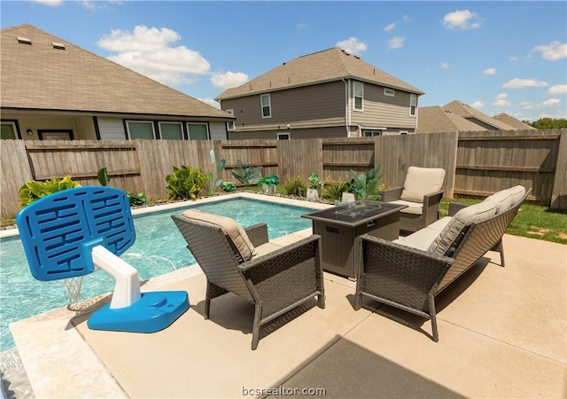 view of pool featuring an outdoor fire pit