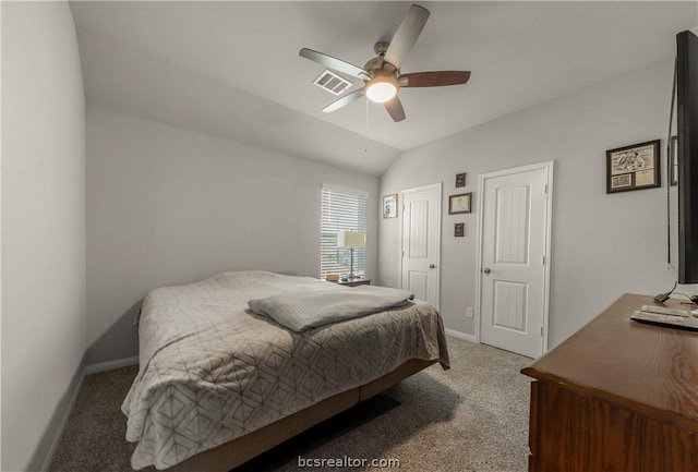 bedroom with carpet floors, vaulted ceiling, and ceiling fan