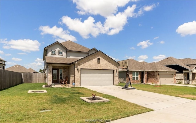 view of front of house featuring a garage and a front lawn