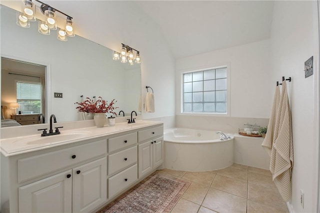 full bath with tile patterned flooring, a sink, and a wealth of natural light
