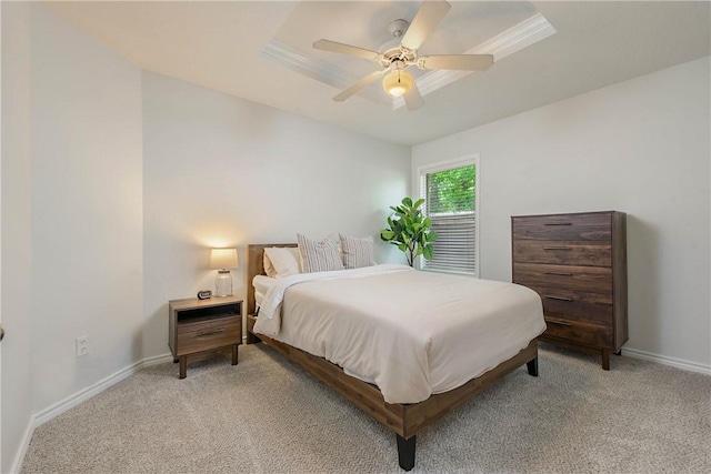 bedroom featuring baseboards, light carpet, and a ceiling fan