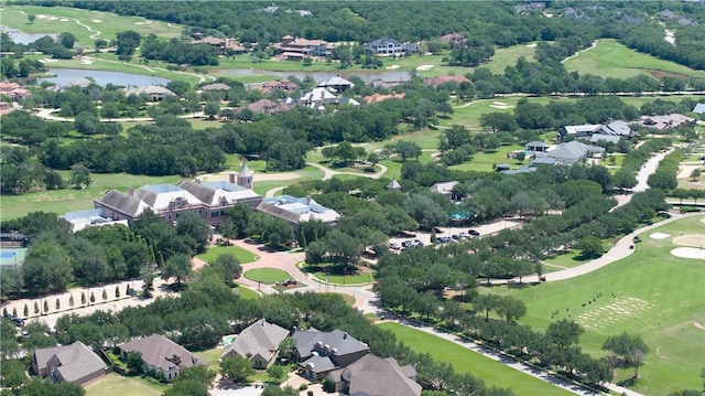 4718 Miramont Cir, Bryan, TX 77802 - aerial view of residential area featuring a large body of water and a golf club