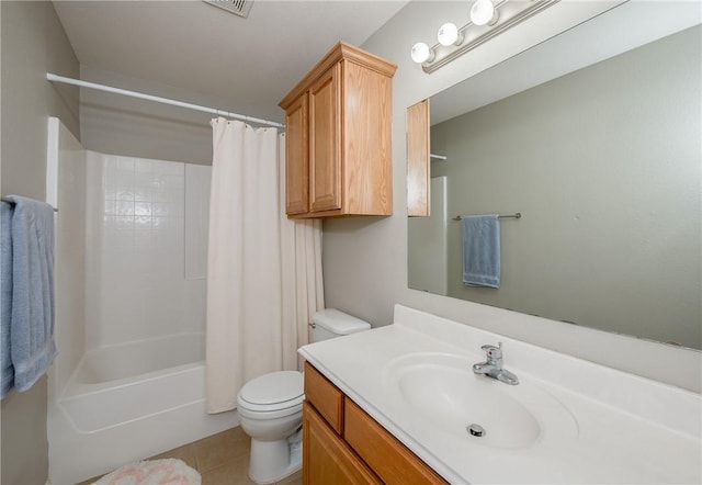 full bath with shower / tub combo, vanity, toilet, and tile patterned floors