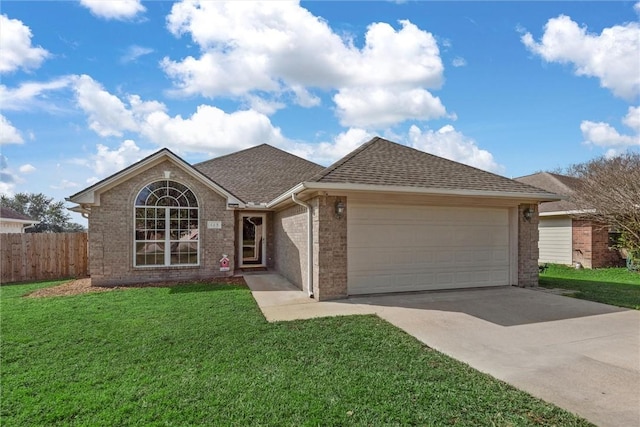 single story home featuring a front lawn and a garage