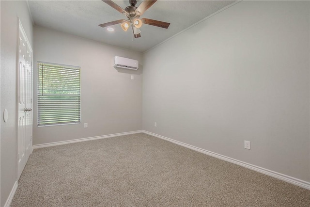 808 N Washington Ave, Bryan, TX 77803 - carpeted spare room with a wall unit AC, a ceiling fan, and baseboards