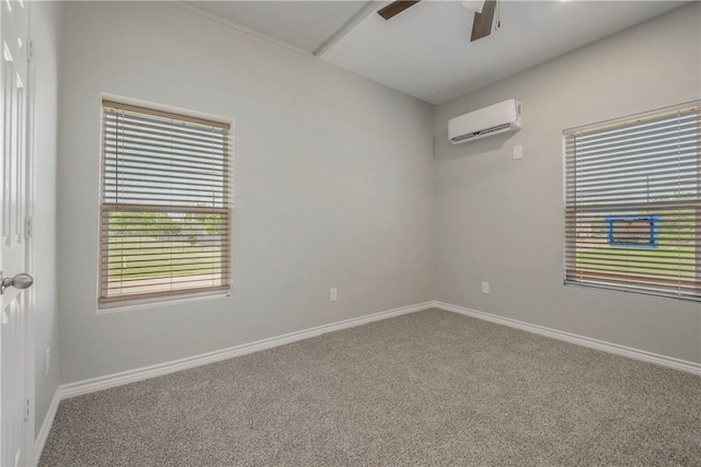 808 N Washington Ave, Bryan, TX 77803 - spare room featuring a wall mounted AC, carpet floors, baseboards, and a ceiling fan