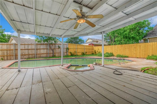 2430 E Briargate Dr, Bryan, TX 77802 - deck with a fenced backyard, ceiling fan, and a pool with connected hot tub