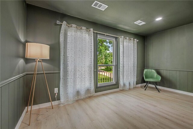 2430 E Briargate Dr, Bryan, TX 77802 - unfurnished room featuring wood finished floors and wainscoting