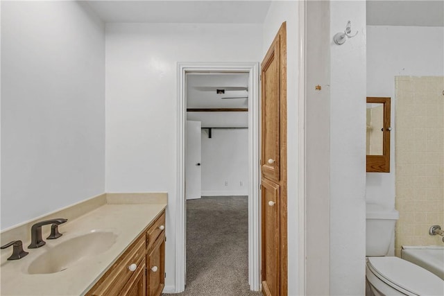 2430 E Briargate Dr, Bryan, TX 77802 - bathroom featuring toilet, vanity, and shower / bathtub combination