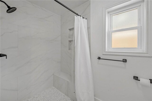 2430 E Briargate Dr, Bryan, TX 77802 - full bathroom featuring a tile shower
