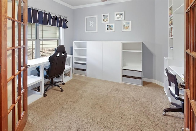 carpeted home office with ornamental molding