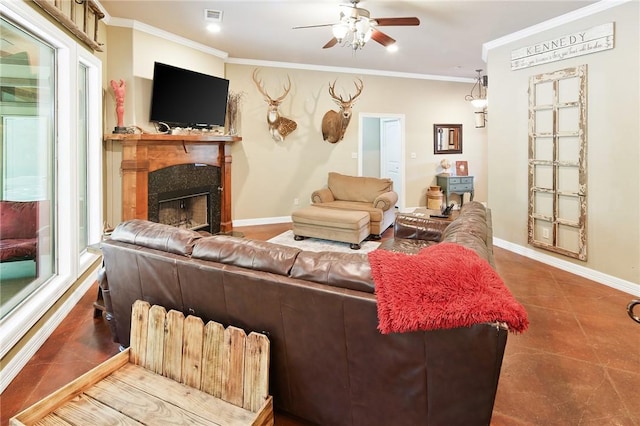 living room with tile patterned flooring, a premium fireplace, and crown molding