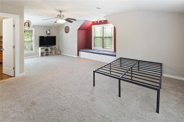 rec room featuring carpet flooring, ceiling fan, and lofted ceiling