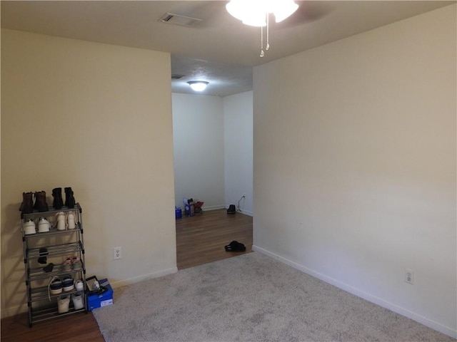 laundry area with carpet flooring