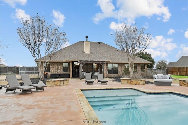 view of pool featuring a gazebo, an outdoor living space, and a patio