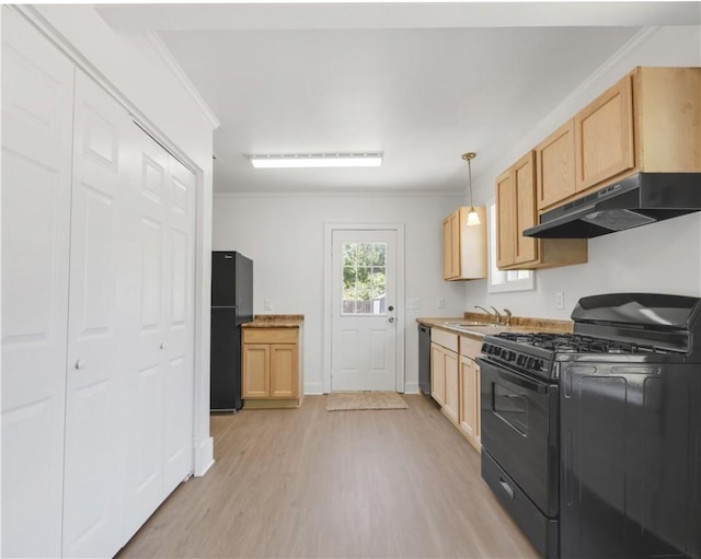 kitchen featuring ornamental molding, black appliances, under cabinet range hood, light brown cabinetry, and light wood-style floors