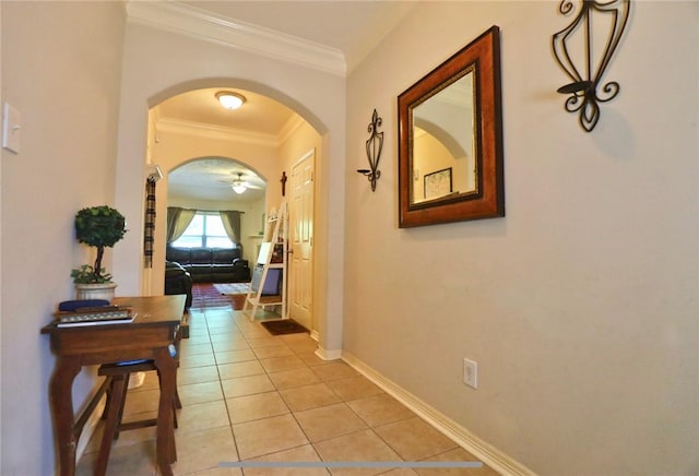 2401 Woodbend Dr, Bryan, TX 77803 - hall with arched walkways, ornamental molding, and light tile patterned floors