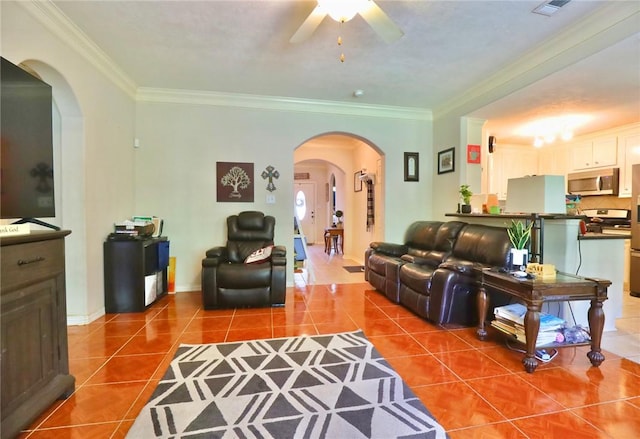 2401 Woodbend Dr, Bryan, TX 77803 - tiled living area featuring arched walkways, crown molding, and a ceiling fan