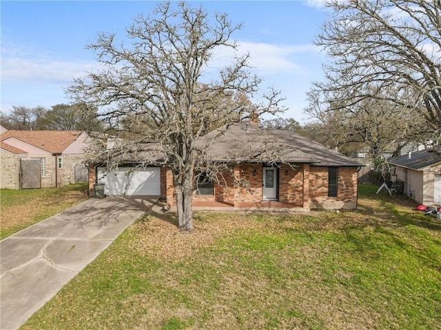 view of front of property with a garage and a front yard