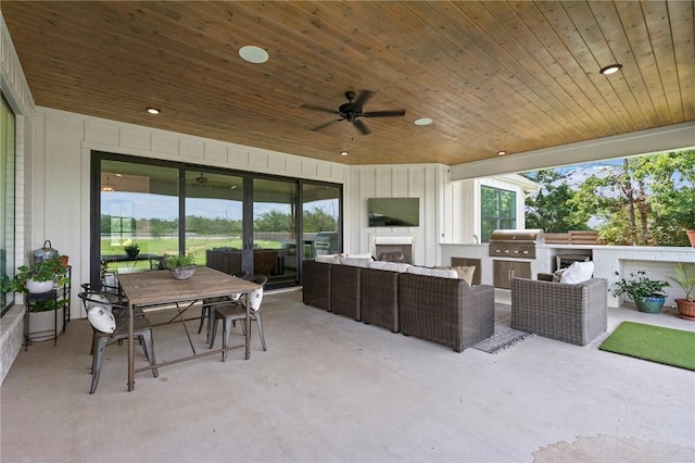 6038 Rain Meadow Dr, College Station, TX 77845 - view of patio / terrace featuring an outdoor living space with a fireplace, outdoor dining space, and ceiling fan