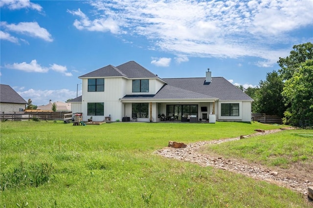 6038 Rain Meadow Dr, College Station, TX 77845 - back of property featuring a chimney