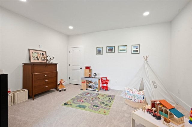 6038 Rain Meadow Dr, College Station, TX 77845 - rec room with light colored carpet and recessed lighting