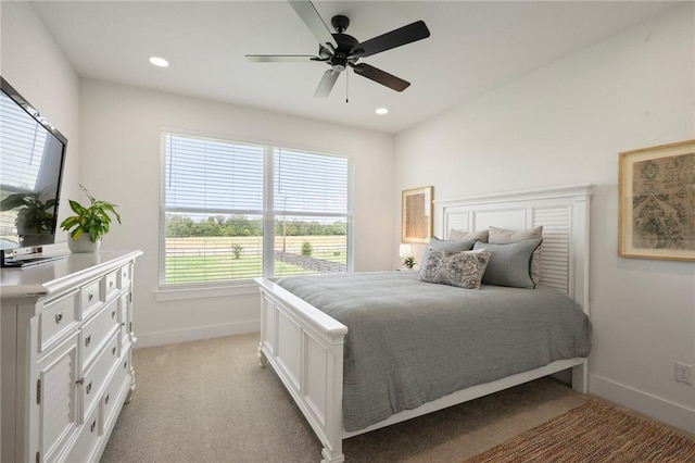 6038 Rain Meadow Dr, College Station, TX 77845 - bedroom featuring baseboards, light carpet, recessed lighting, and a ceiling fan