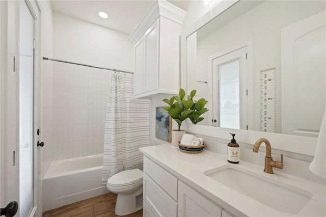 6038 Rain Meadow Dr, College Station, TX 77845 - bathroom featuring vanity, wood finished floors, toilet, shower / bath combo with shower curtain, and recessed lighting
