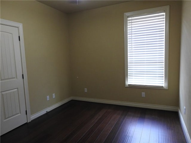2622 Forest Oaks Dr, College Station, TX 77845 - unfurnished room featuring dark wood-style floors and baseboards