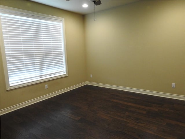 2622 Forest Oaks Dr, College Station, TX 77845 - empty room with dark wood-style flooring, a ceiling fan, and recessed lighting
