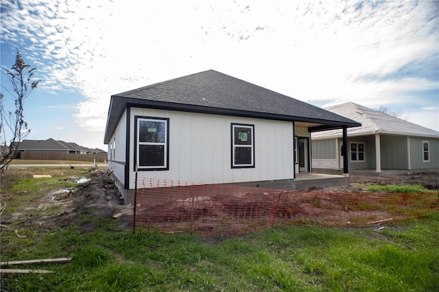 back of house with a patio