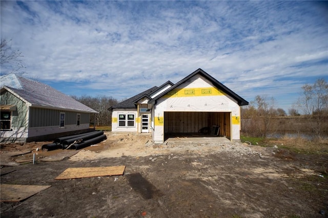 property in mid-construction featuring a garage