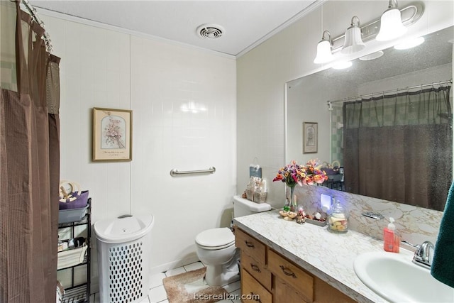 bathroom with vanity, toilet, crown molding, tile patterned floors, and a shower with shower curtain