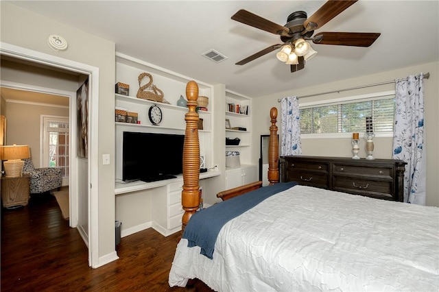 bedroom with ceiling fan and dark hardwood / wood-style flooring