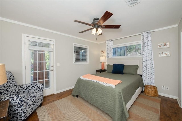 bedroom with crown molding and wood-type flooring