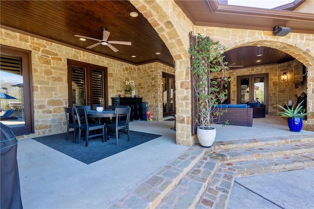 view of patio featuring ceiling fan, french doors, an outdoor hangout area, and outdoor dining space