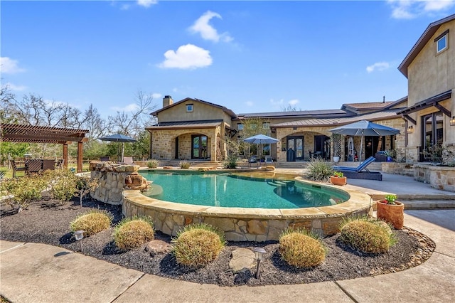 outdoor pool featuring a patio and a pergola