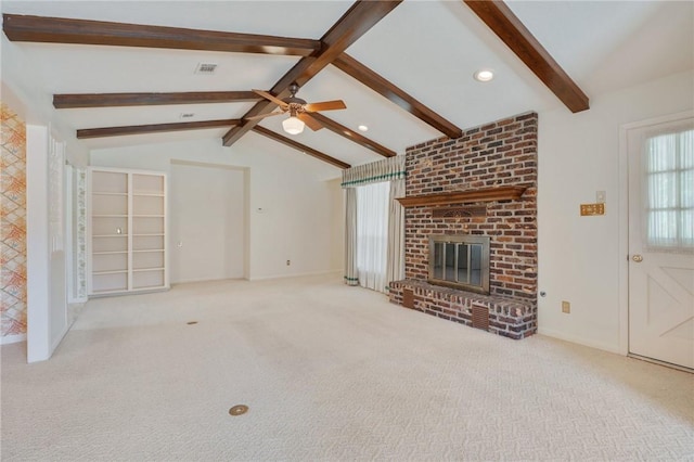 unfurnished living room featuring a fireplace and light colored carpet