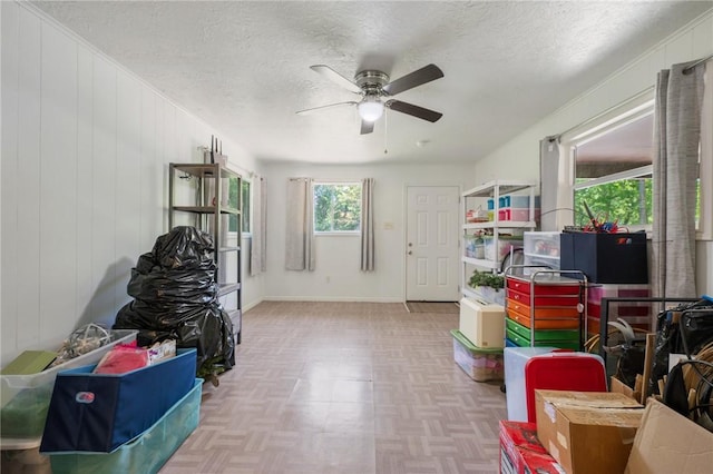 interior space featuring a ceiling fan