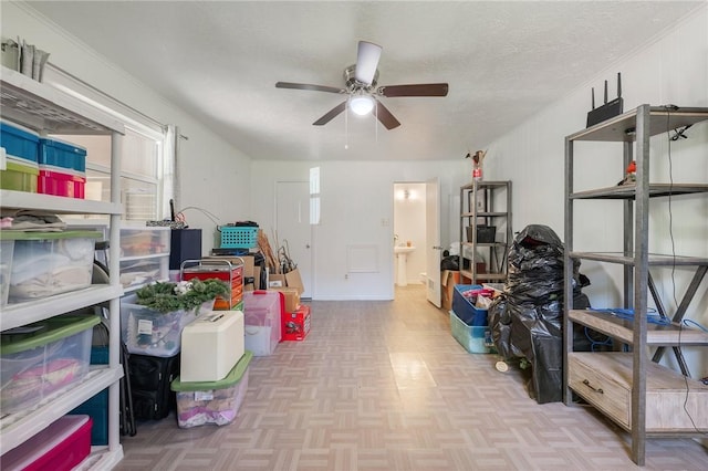 storage area with ceiling fan