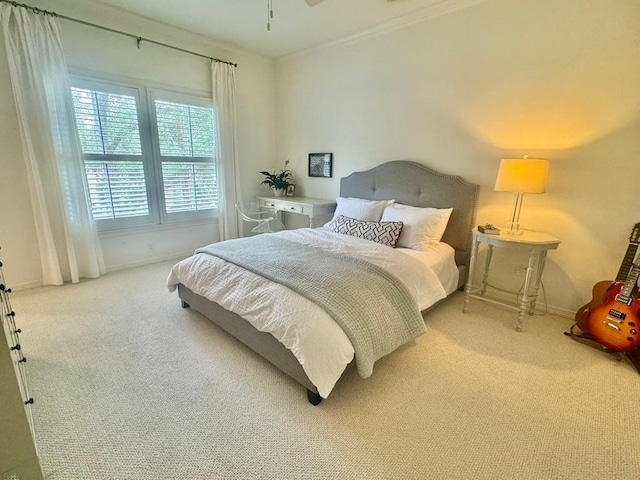 3911 Swarthmore St, Houston, TX 77005 - carpeted bedroom with baseboards and crown molding