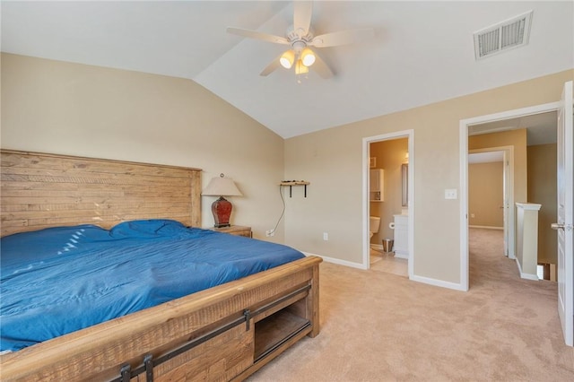 1725 Harvey Mitchell Pkwy, College Station, TX 77840 - bedroom with lofted ceiling, baseboards, ceiling fan, visible vents, and light colored carpet