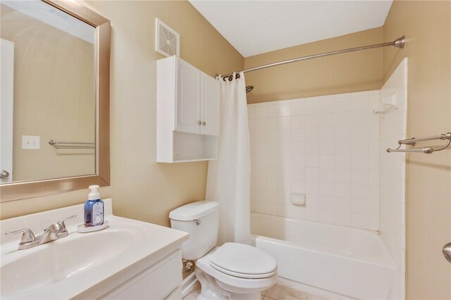 1725 Harvey Mitchell Pkwy, College Station, TX 77840 - full bath with vanity, toilet, shower / bathtub combination with curtain, and visible vents