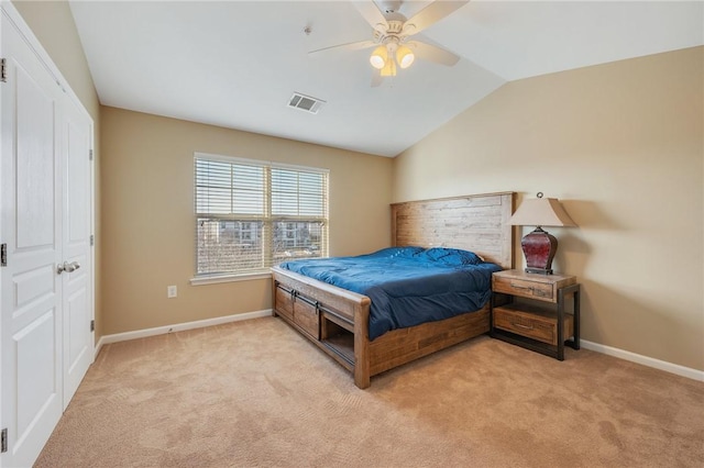 1725 Harvey Mitchell Pkwy, College Station, TX 77840 - bedroom featuring baseboards, light carpet, visible vents, and lofted ceiling