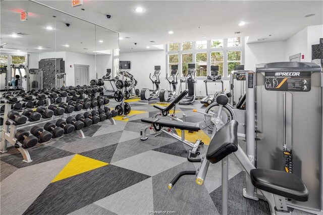 1725 Harvey Mitchell Pkwy, College Station, TX 77840 - exercise room with a ceiling fan and recessed lighting