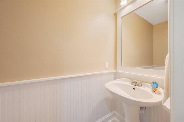 1725 Harvey Mitchell Pkwy, College Station, TX 77840 - bathroom with wainscoting