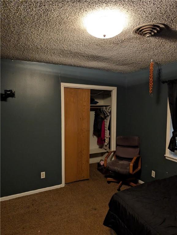 812 Victoria St, Navasota, TX 77868 - carpeted bedroom with a closet