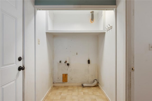 laundry room featuring baseboards, electric dryer hookup, and washer hookup