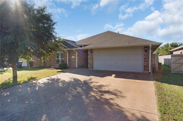 ranch-style house with a front lawn and a garage