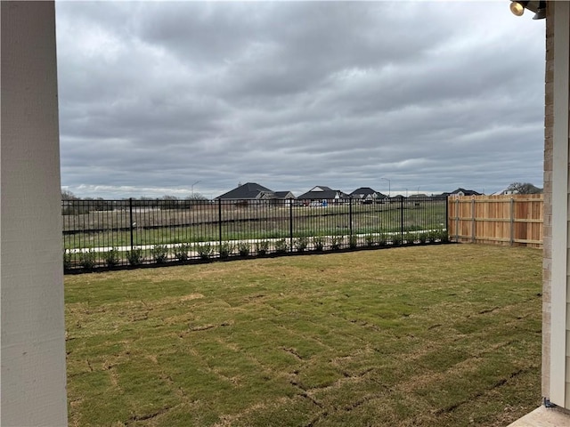 view of yard with fence